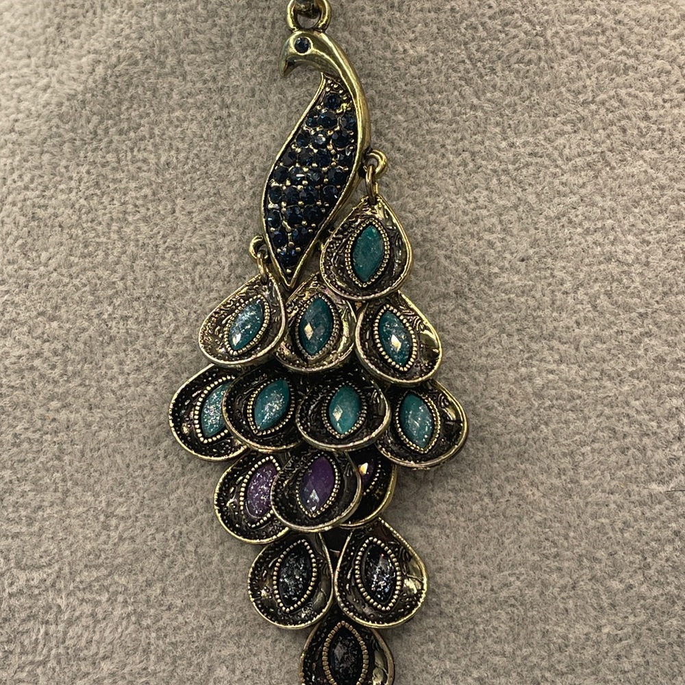 Elegant Peacock Pendant Necklace individually knotted a brushed antique gold